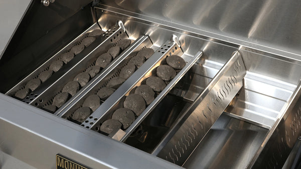 Stainless steel grill with charcoal grates inside