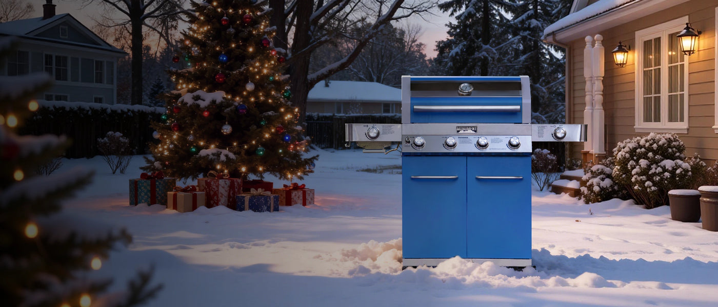 Blue barbecue grill in a snowy backyard with Christmas decorations and a house in the background.