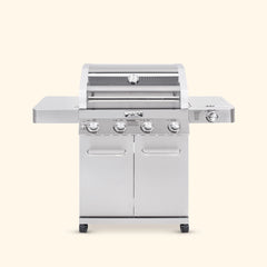 Stainless steel gas grill on a white background