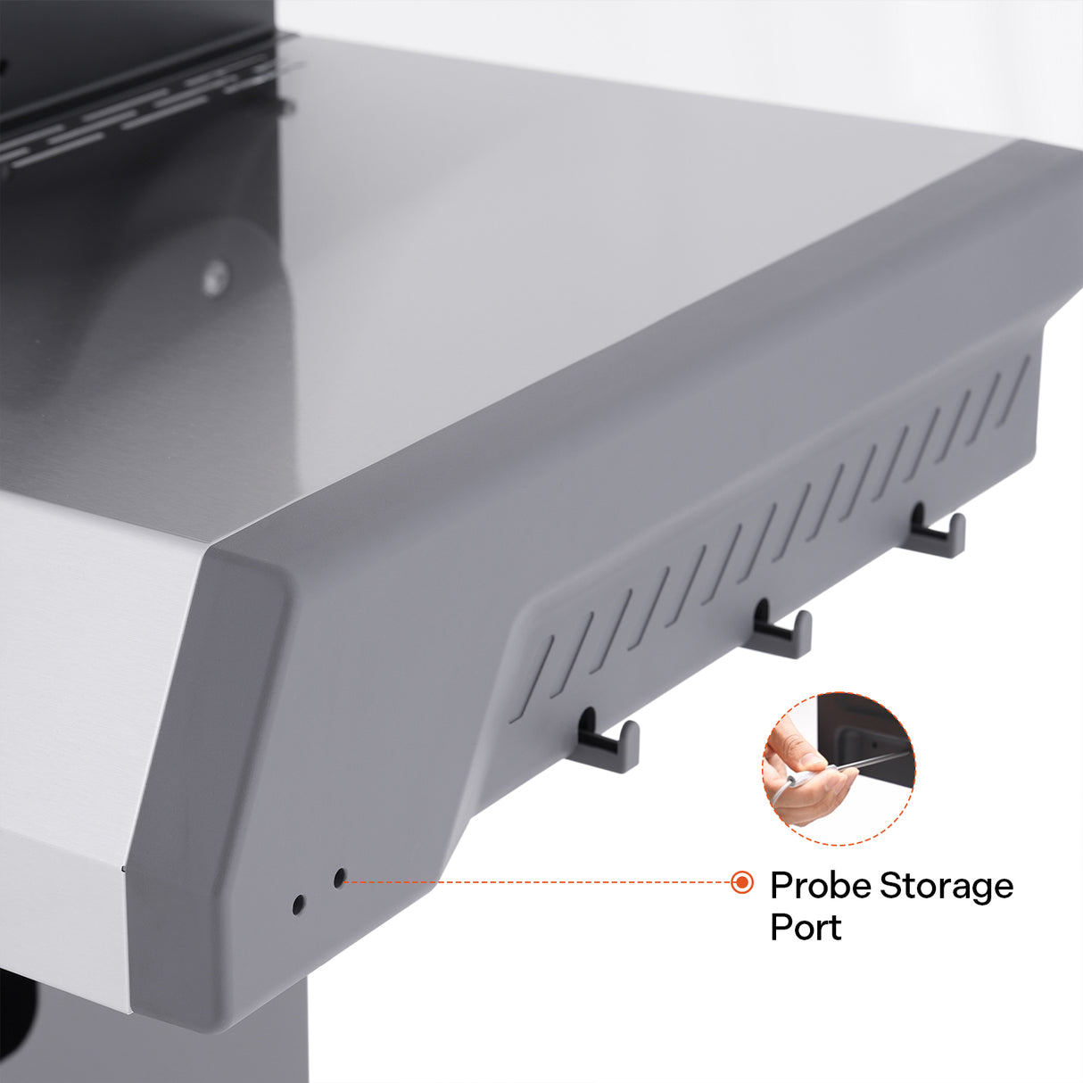 Probe storage port on a grill with close-up inset