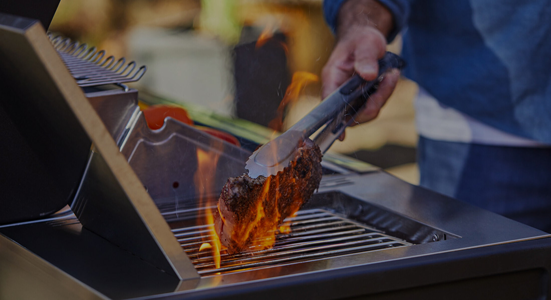Searing food on an original Monument Grills product