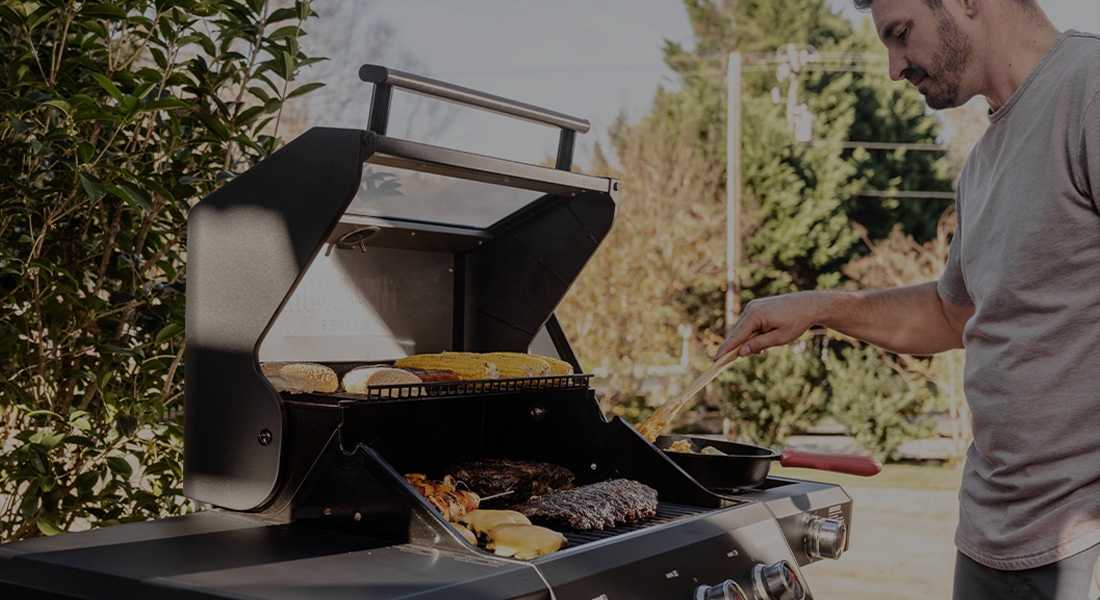 Outdoor cooking with a Monument Grills gas grill