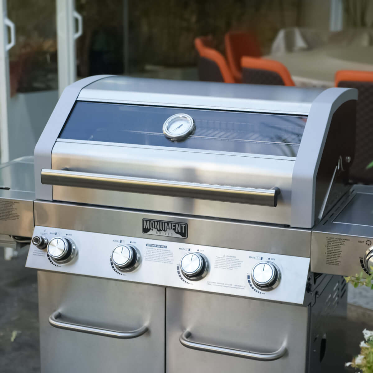 Monument Grills Clearview Lid 4 Burner with Side Sear Burner Propane Gas Grill Size 22.5 Silver