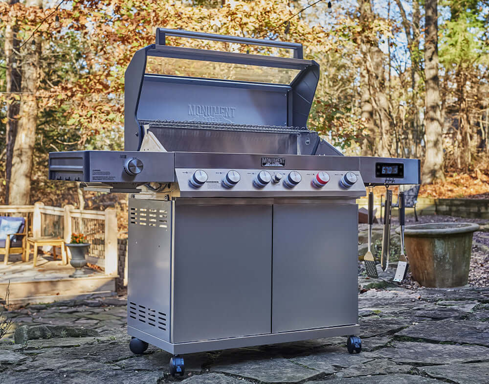 Monument grill in a backyard showroom