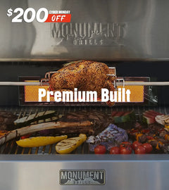 Grill with food being cooked, featuring Monument Grills branding and a Black Friday discount offer.