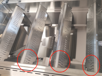 How should I properly install or replace the flame tamers?