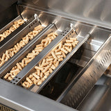 Metallic grill with wood pellets inside, likely for smoking food.