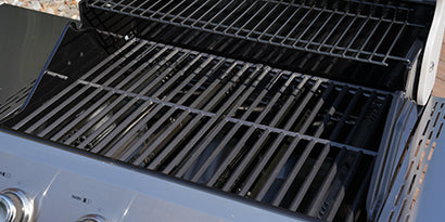 Close-up of a grill with grates on a sunny day