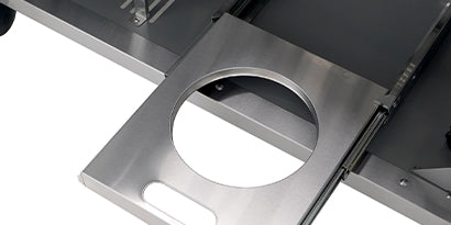 Metallic object with a circular cutout on a white background