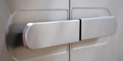 Close-up of a metallic handle on a door