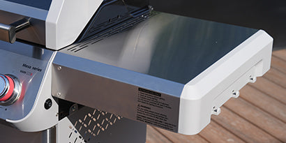 Close-up of a portable grill on a wooden surface