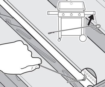 What is the chain and metal rod included with the grill?
